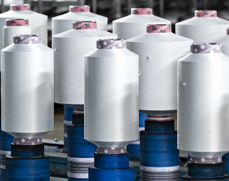 Spools of recycled polyester fiber 