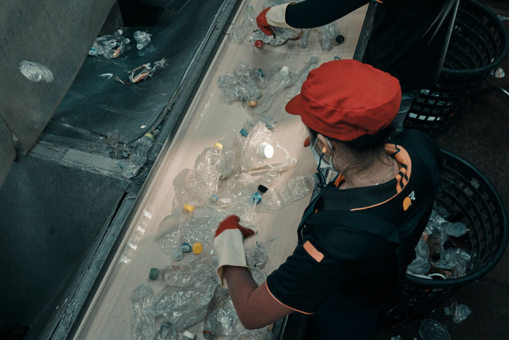 Sorting plastic bottles for recycling PET